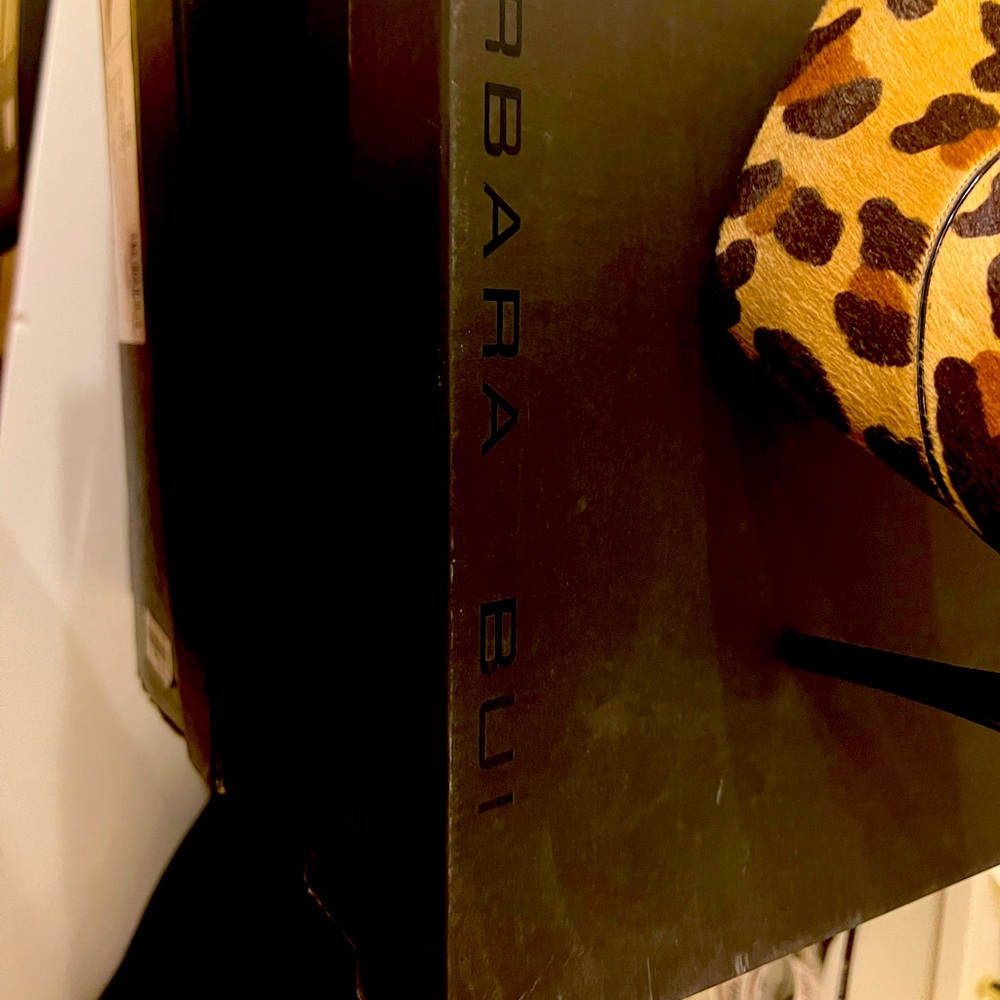Leopard booties good condition in its original box.